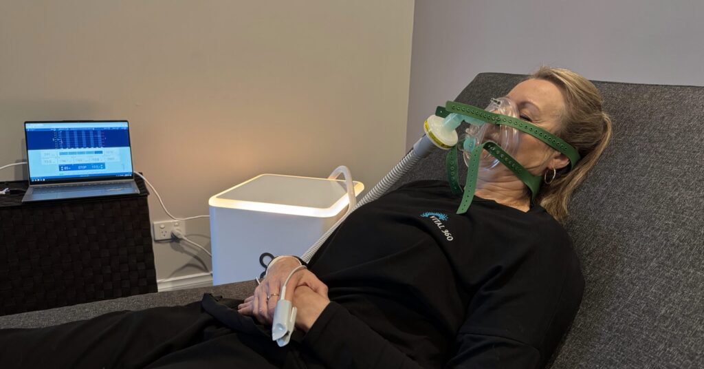 Client doing altitude training (Cellgym) at Vital 360 Ballarat.