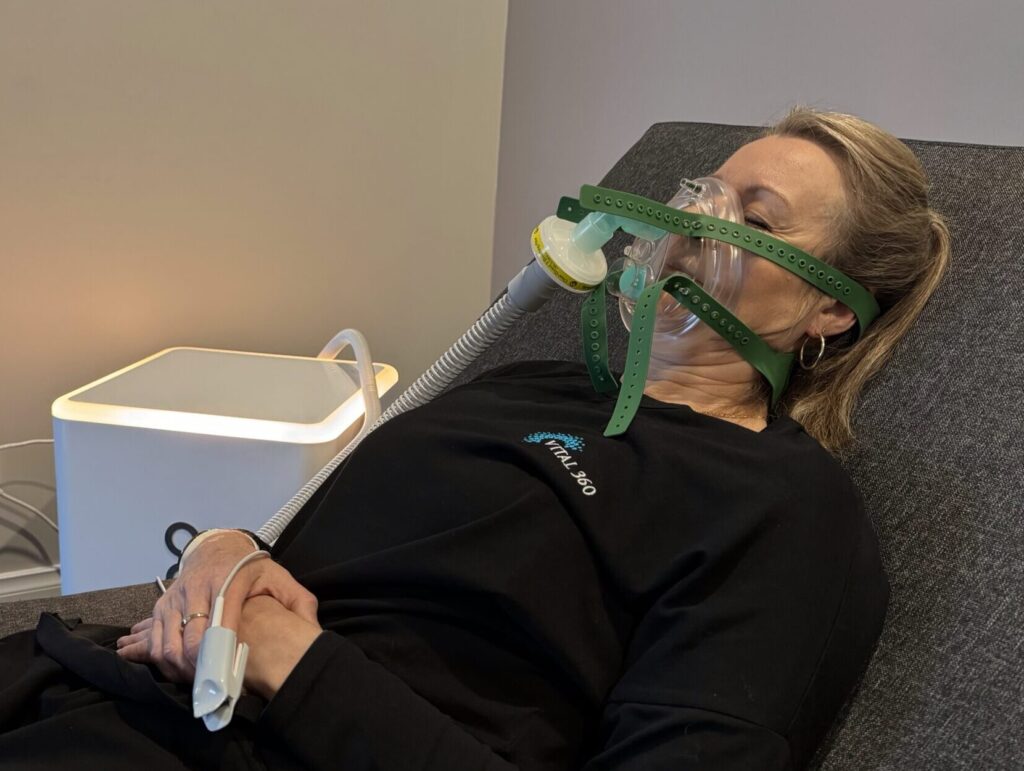 Client doing altitude training (Cellgym) at Vital 360 Ballarat.